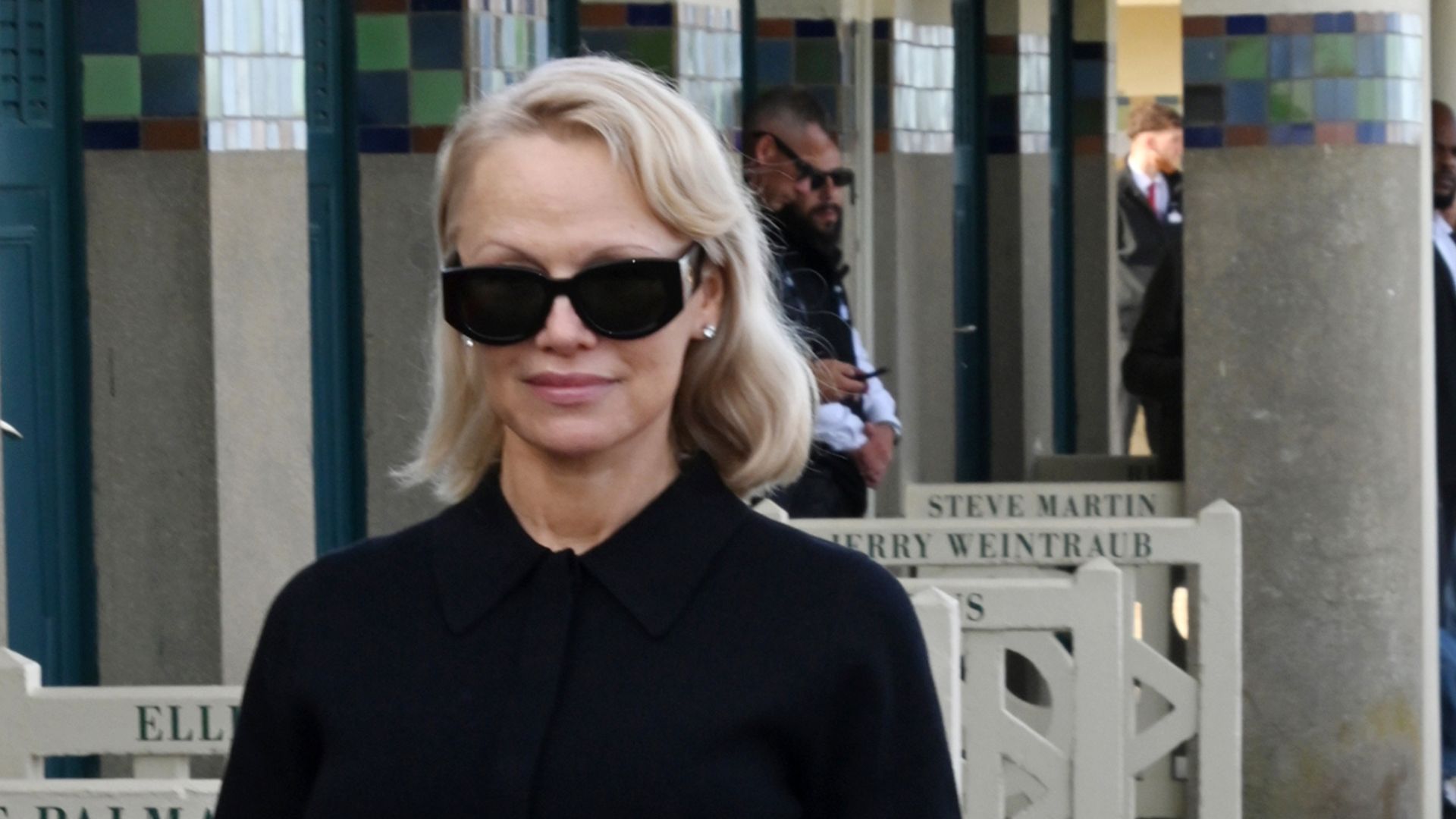 PAMELA ANDERSON WEARING BLACK 