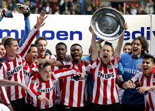 PSV players celebrate in April 2008 after winning the Eredivisie title for a fourth season in a row.