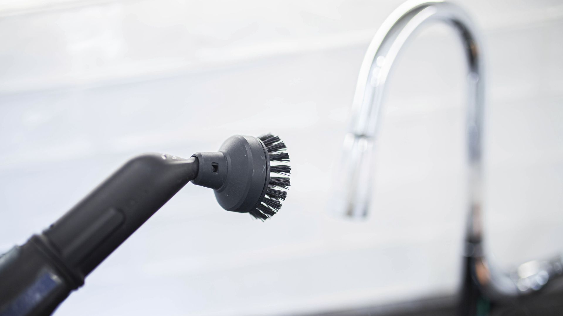 A steam cleaner being used at home