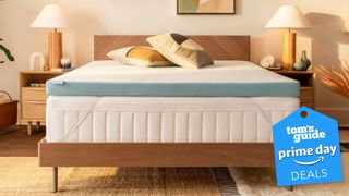 Tempur-Pedic Tempur-Adapt + Cooling mattress topper on a mattress in bedroom with wooden bed base, two bedside lamps and wooden bedside tables. 