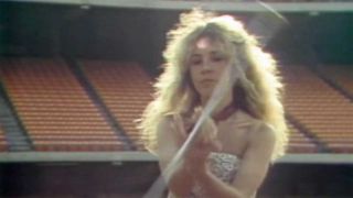Stevie Nicks twirling a baton in the video for Tusk