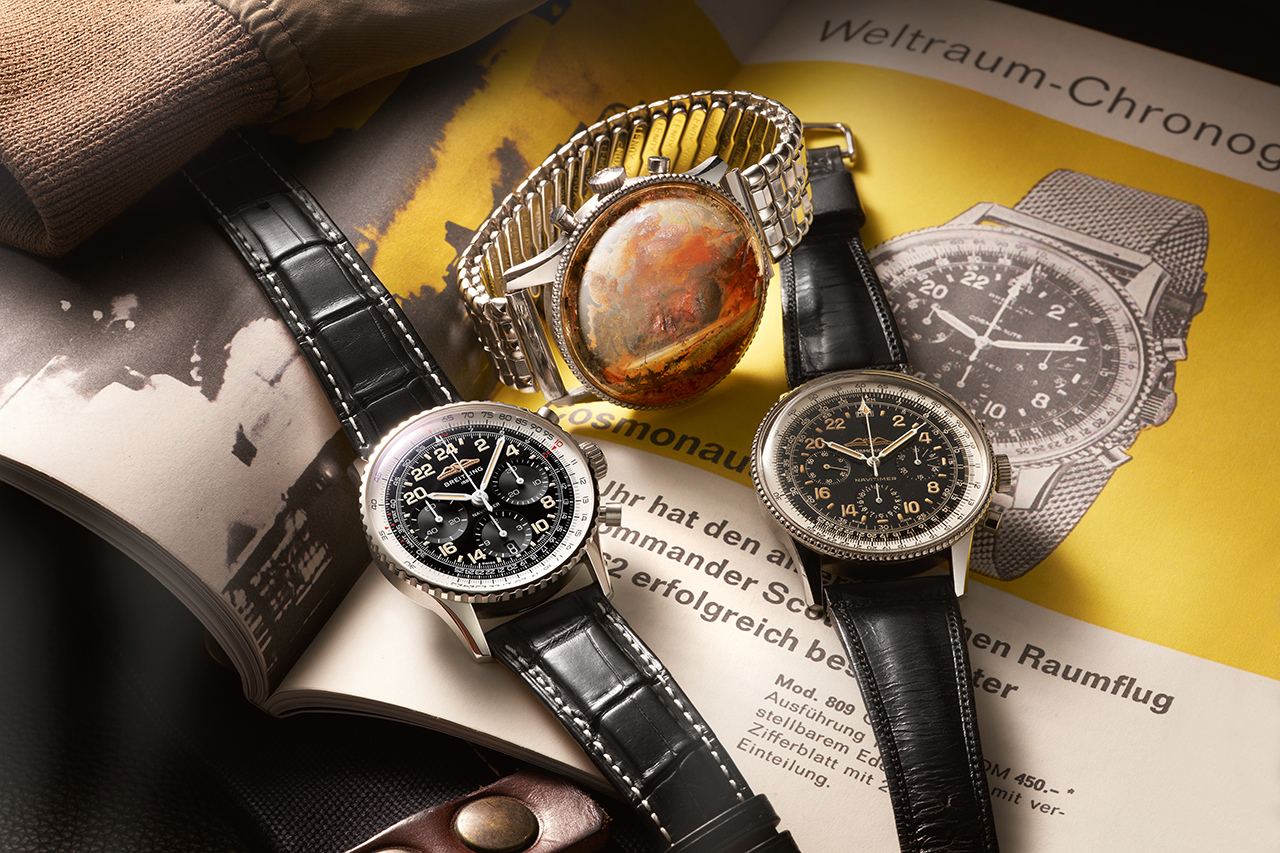 Breitling's new 2022 Navitimer Cosmonaute beside a 1962 model and the original watch worn by Scott Carpenter in space.