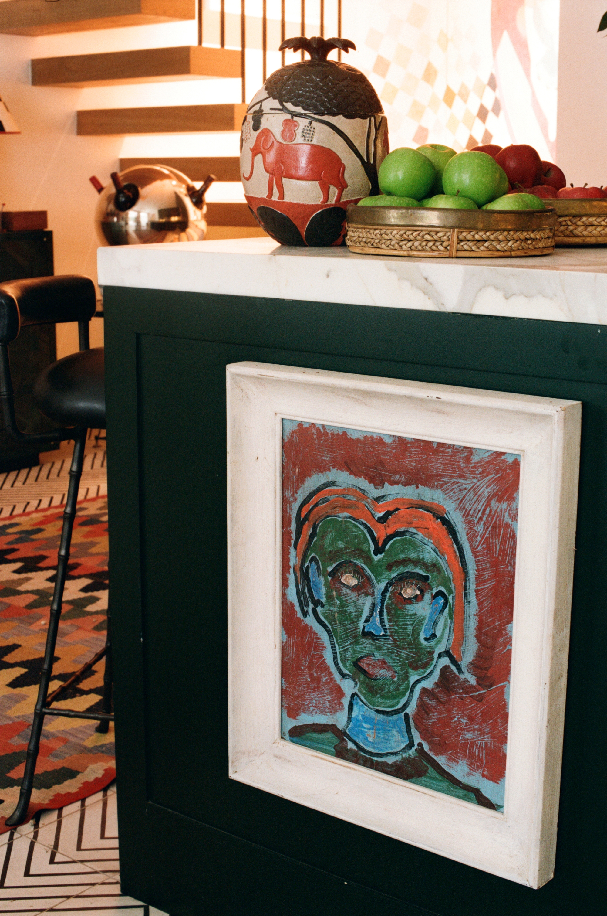 Art on the side of a kitchen island