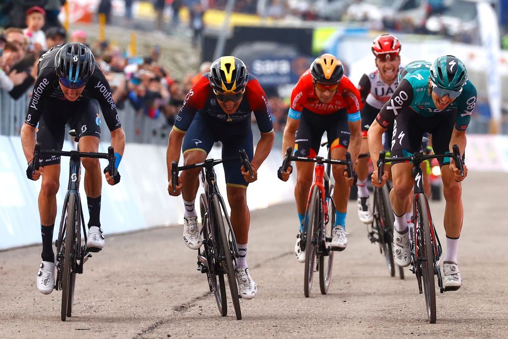 Team DSMs French rider Romain Bardet L Team Ineos Ecuadorian rider Richard Carapaz 2nd L Team Bahrains Spanish rider Mikel Landa C and Team Boras Australian rider Jai Hindley R sprint to the finish line during the 9th stage of the Giro dItalia 2022 cycling race 191 kilometers between Isernia and the Blockhaus mountain in the Majella national park near Chieti southern Italy on May 15 2022 Photo by Luca Bettini AFP Photo by LUCA BETTINIAFP via Getty Images