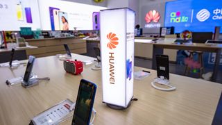 Huawei smartphones on display in a Shanghai retail store