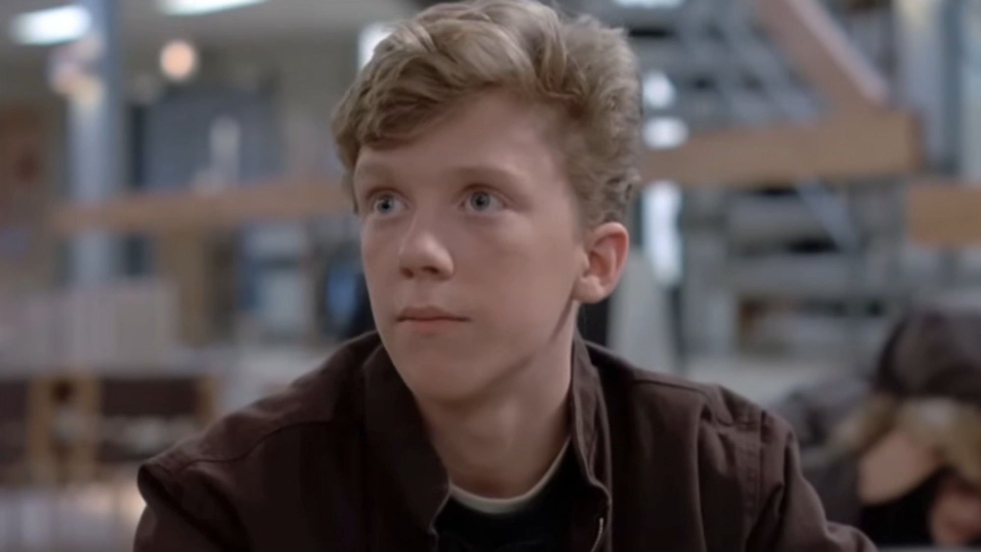 A close up of Anthony Michael Hall looking to his right in The Breakfast Club