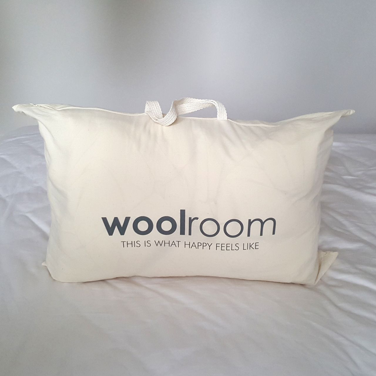 The Woolroom Deluxe Washable Wool Duvet being tested on a bed