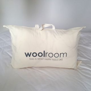 The Woolroom Deluxe Washable Wool Duvet being tested on a bed