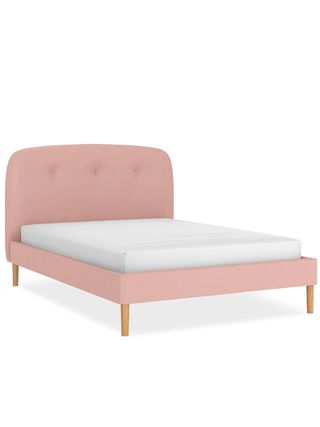 Blush fabric upholstery with three button headboard and white mattress