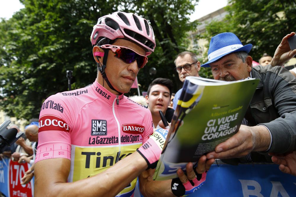 Alberto Contador signing some autographs for fans