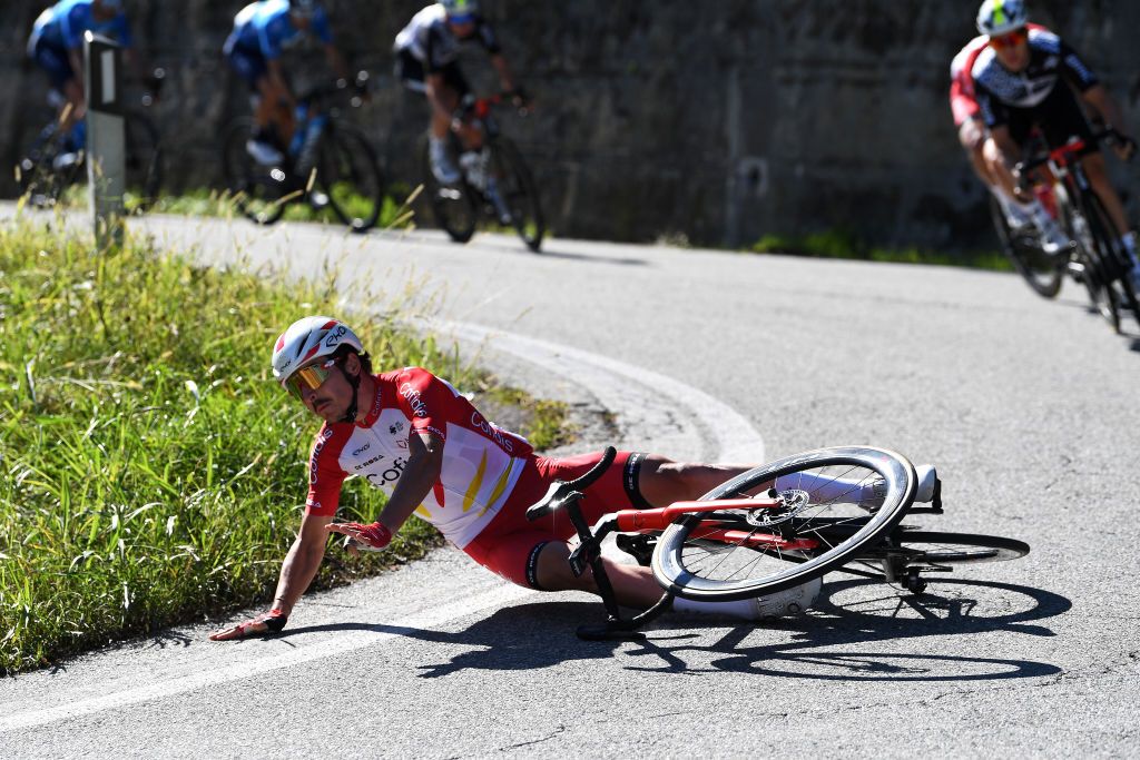 BORGOSESIA ITALY OCTOBER 07 Hugo Toumire of France and Team Cofidis crash during the 105th Gran Piemonte 2021 a 168km race from Rocca Canavese to Borgosesia 350m GranPiemonte on October 07 2021 in Borgosesia Italy Photo by Tim de WaeleGetty Images