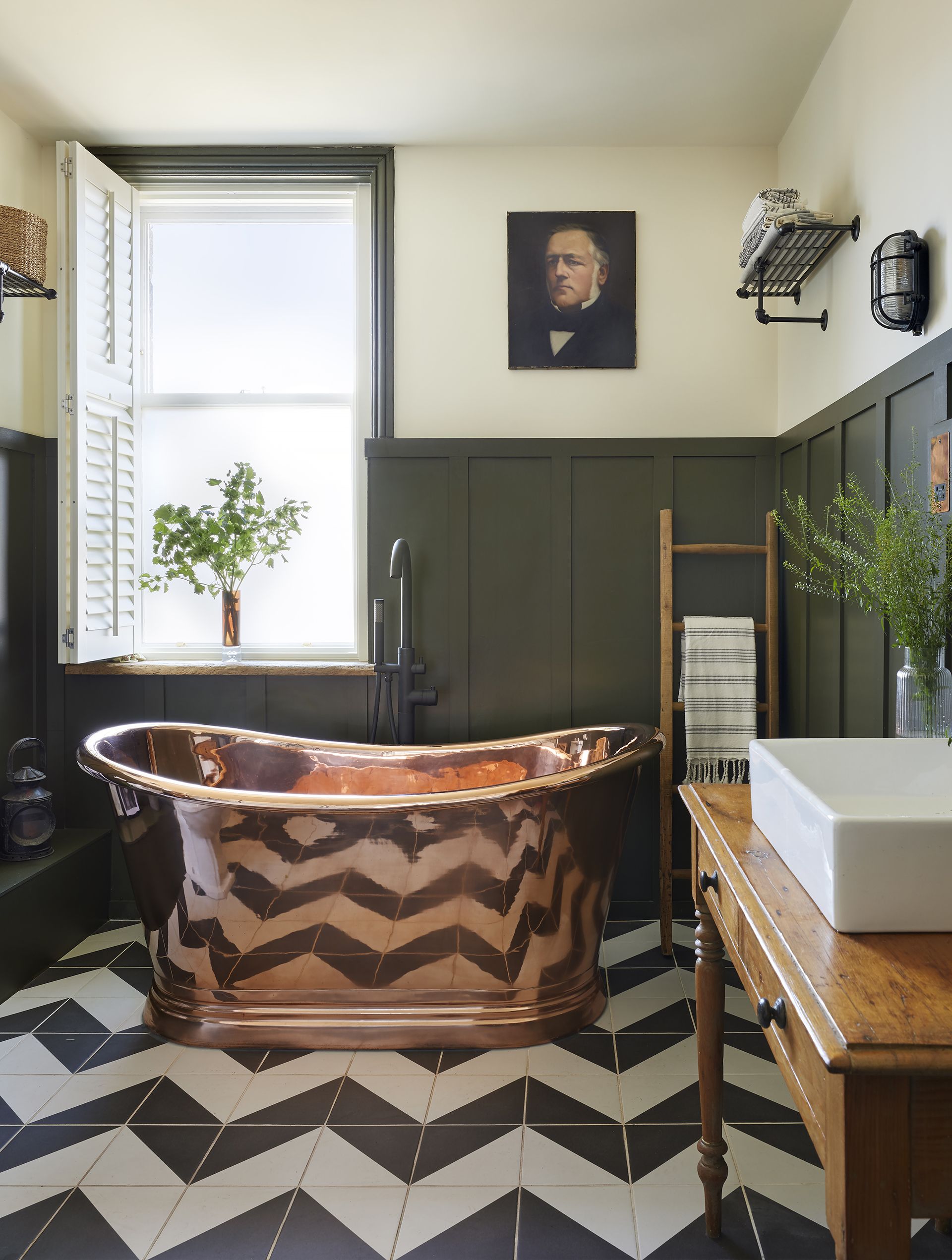 copper bath in dark bathroom