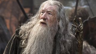 Ian McKellen looking up as Gandalf