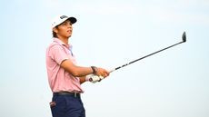 Charlie Woods hits a driver off the tee