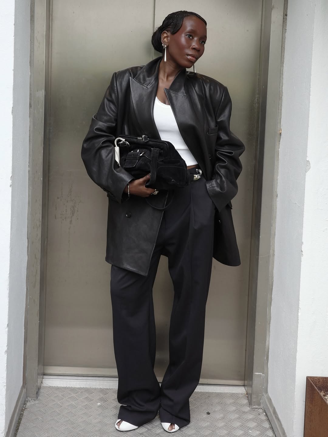 Danielle Jinadu wearing an upturned collar blazer