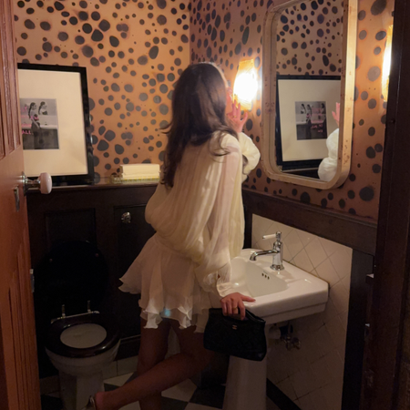 An image of a woman wearing best long sleeve fall dress 2026