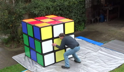 Tony Fisher shows off his Rubik's Cube