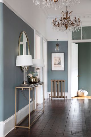 To flatter the elegant proportions of their flat, Iain Martin and Eóin Colgan rethought the layout and filled it with rich colours, drapes and chandeliers