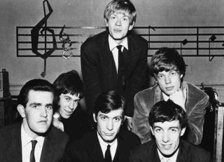 Rolling Stones posing for a photograph in the early 1960s