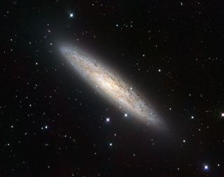 The VLT Survey Telescope (VST) has captured in sharp detail the beauty of the nearby spiral Sculptor Galaxy NGC 253. This new portrait is probably the best wide-field view of this object and its surroundings ever taken, officials say.