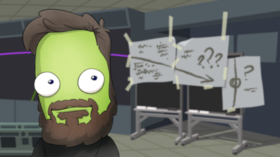 Green kerbal alien standing in front of scientific drawings