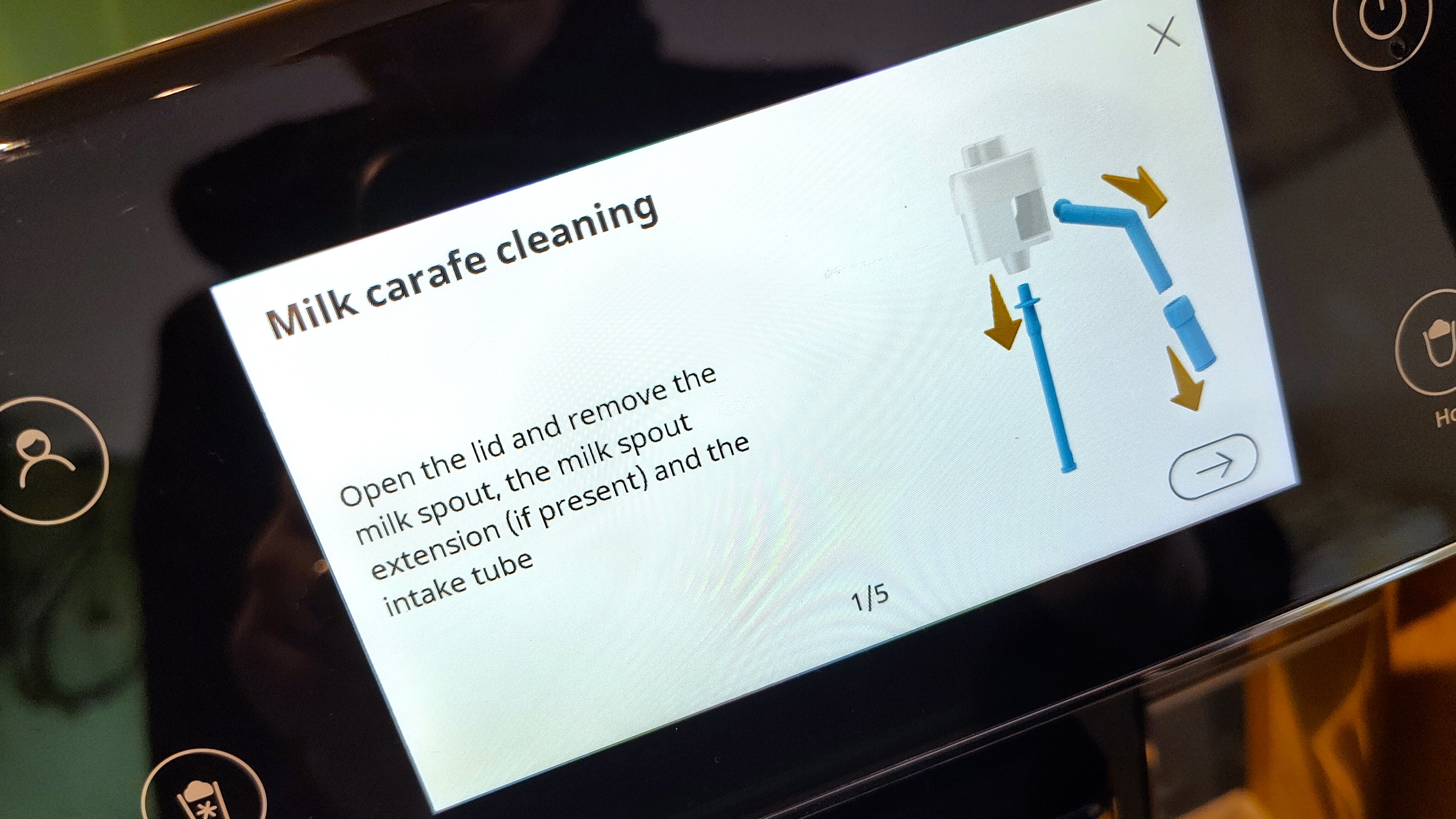 Instructions for cleaning milk carafe on Primadonna Aromatic coffee maker