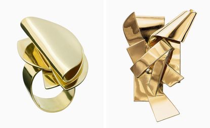 Abstract designed gold ring on left, gold plated brooch on right