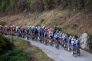 SAN DANIELE DEL FRIULI ITALY OCTOBER 20 Wilco Kelderman of The Netherlands and Team Sunweb Joao Almeida of Portugal and Team Deceuninck QuickStep Pink Leader Jersey Fausto Masnada of Italy and Team Deceuninck QuickStep Pieter Serry of Belgium and Team Deceuninck QuickStep Mikkel Honore of Denmark and Team Deceuninck QuickStep Madonnina del Domm 949m Peloton during the 103rd Giro dItalia 2020 Stage 16 a 229km stage from Udine to San Daniele Del Friuli 249m girodiitalia Giro on October 20 2020 in San Daniele Del Friuli Italy Photo by Tim de WaeleGetty Images