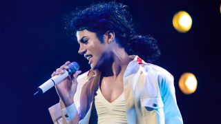 Jafaar Jackson shown singing on stage in Michael. 