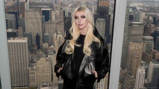 Taylor Momsen in front of a New York City skyline