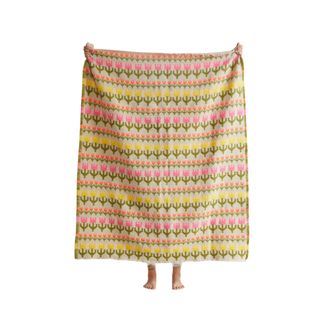 A tulip patterned throw blanket