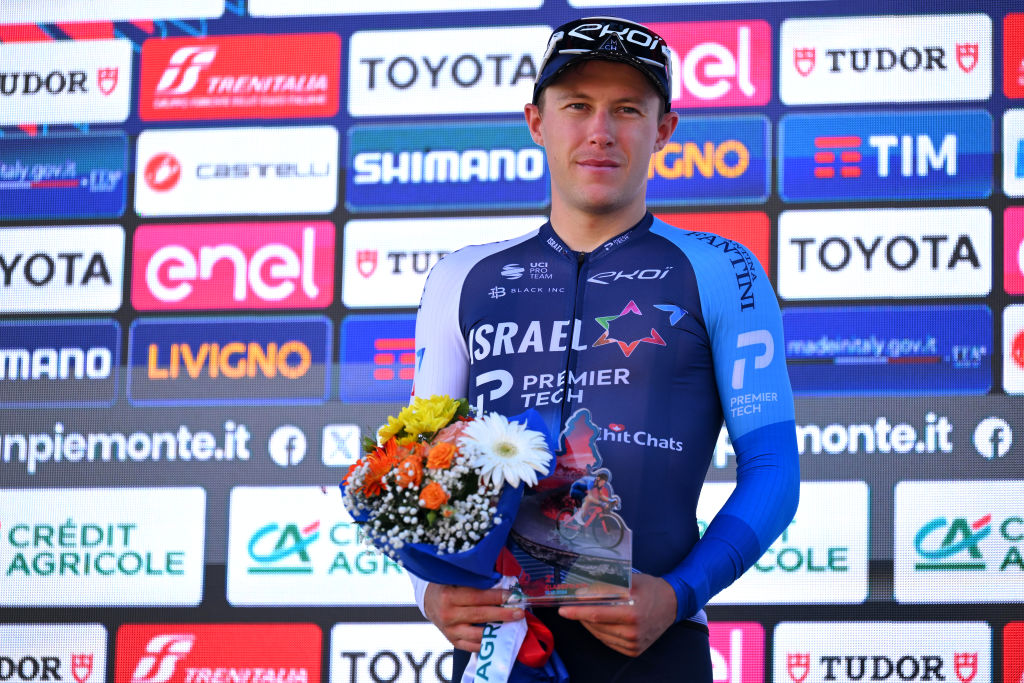 BORGOMANERO ITALY OCTOBER 10 Corbin Strong of New Zealand and Team Israel Premier Tech on second place poses on the podium ceremony after the 108th Gran Piemonte 2024 a 182km one day race from Valdengo to Borgomanero on October 10 2024 in Borgomanero Italy Photo by Tim de WaeleGetty Images