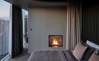 Mauritzhof Hotel bedroom with fireplace in the wall