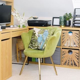 home office with corner desk and green chair