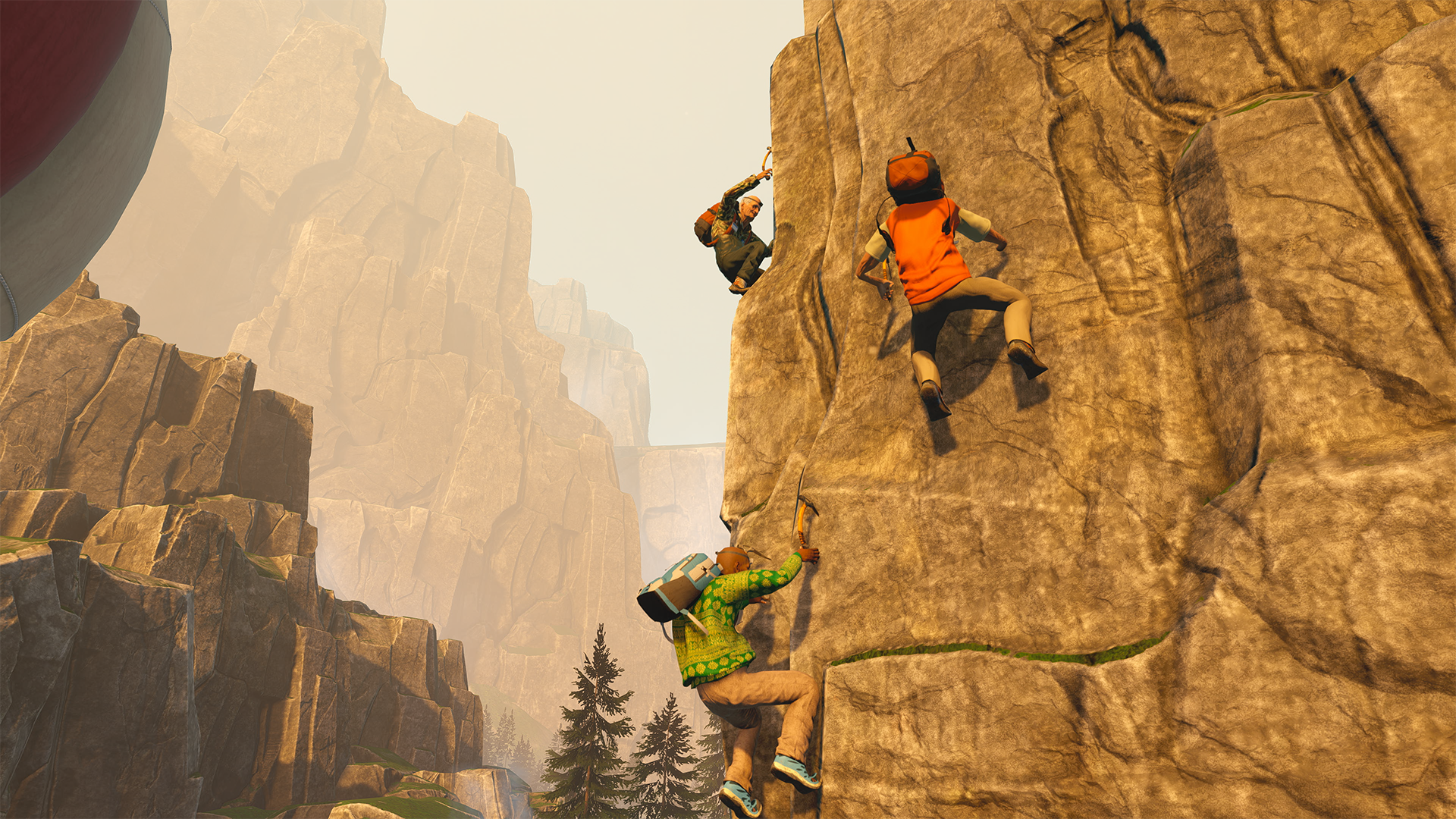Three climbers scaling a rock face