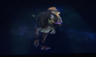 After creating a dinosaur via interactive hologram, visitors watch as it is released into a video environment where it plays.