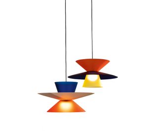 Two outdoor pendant lamps with colourful shades in orange and blue, and red and black