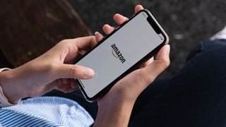 iPhone showing an Amazon logo on screen