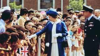 Queen Elizabeth II meets young girl guides