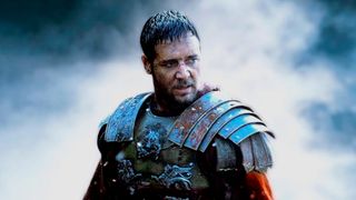 A close-up of Russell Crowe as Maximus Decimus Meridius covered in blood during the movie Gladiator.