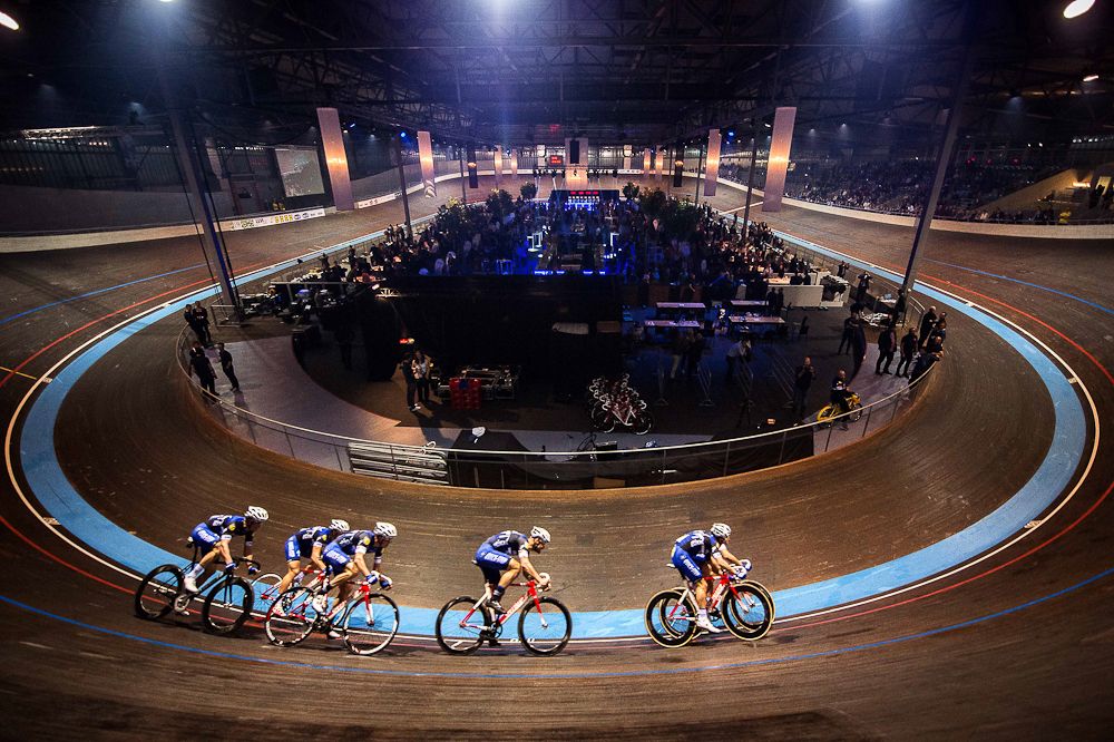 Riders loop the Eddy Merckx track at the Etixx-QuickStep presentation.