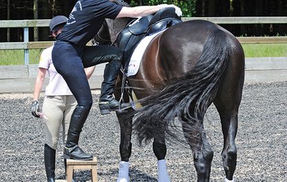 Mounting a horse correctly with block