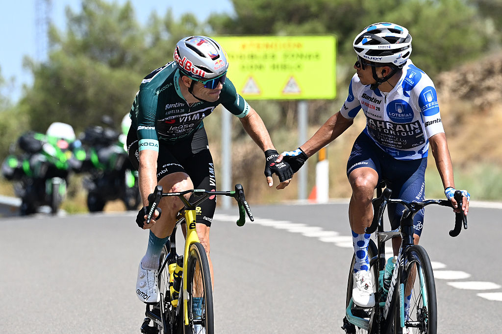 Wout van Aert and Santiago Buitrago shake hands during stage 12 of the Vuelta a Espa&amp;ntilde;a 2026
