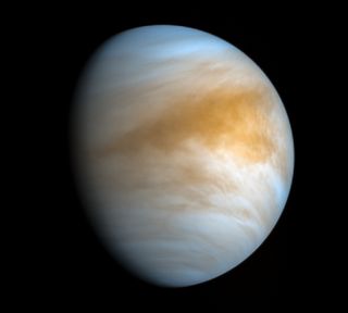 The bizarre and hellish atmosphere of Venus wafts around the planet's surface in this false-color image from the Japanese Aerospace Exploration Agency's Akatsuki spacecraft. Citizen scientist Kevin Gill processed the image using infrared and ultraviolet views captured by Akatsuki on Nov. 20, 2016. 