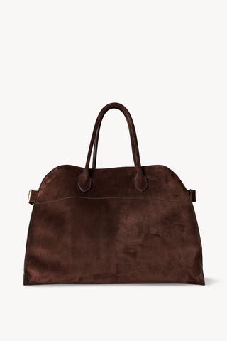 a brown suede tote bag