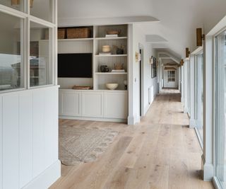 hallway with pale oak engineered wooden flooring