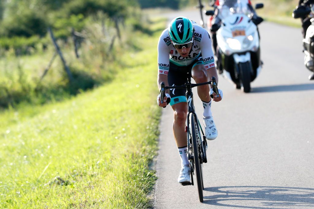 PRZEMYSL POLAND AUGUST 10 Lukas Pstlberger of Austria and Team Bora Hansgrohe attacks during the 78th Tour de Pologne 2021 Stage 2 a 201km stage from Zamo to Przemyl 341m TourdePologne TDP2021 UCIWT on August 10 2021 in Przemysl Poland Photo by Bas CzerwinskiGetty Images