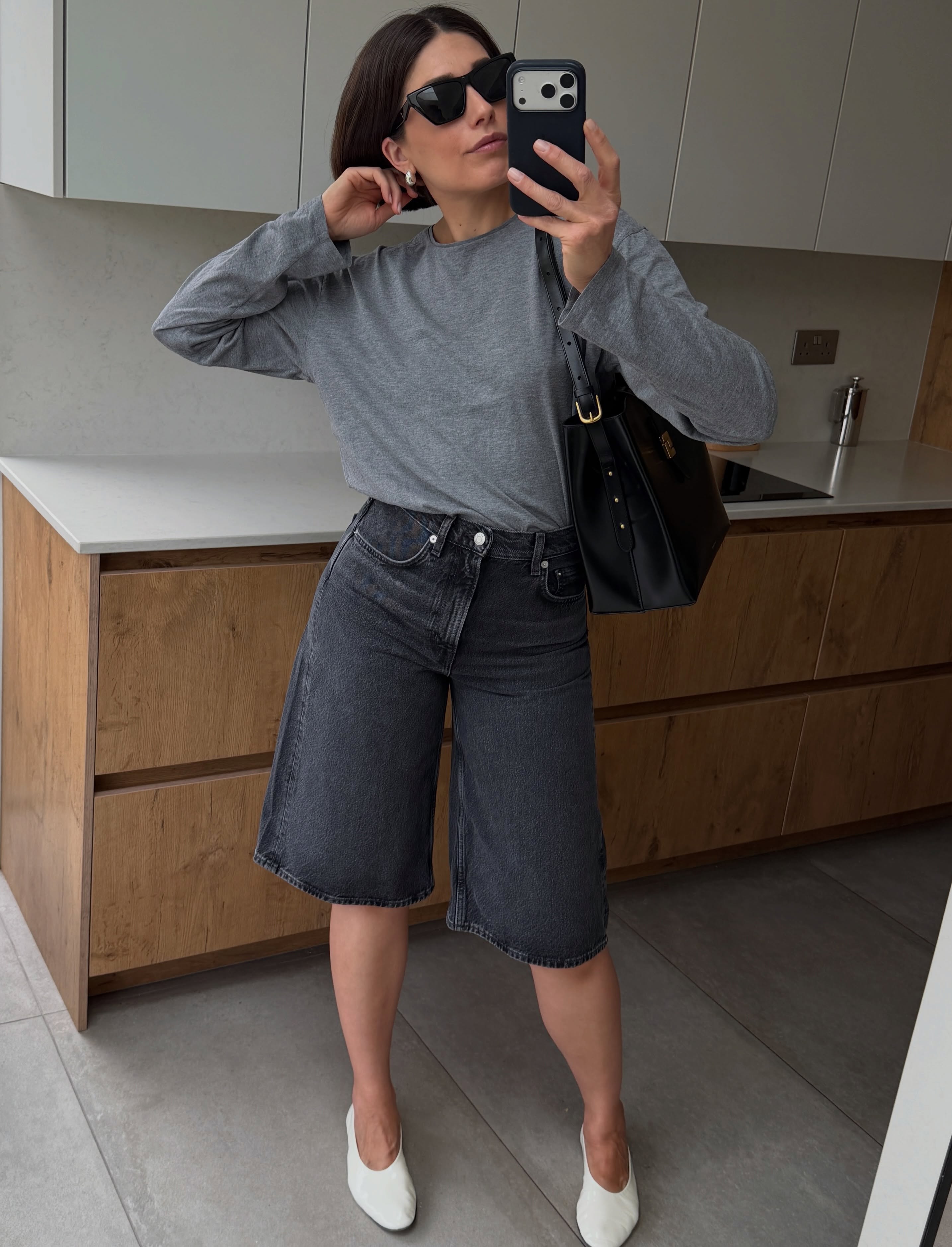 lucy alston wears long sleeve top london summer capsule wardrobe 2026