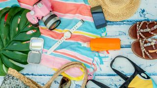 top view woman summer items to go to beach