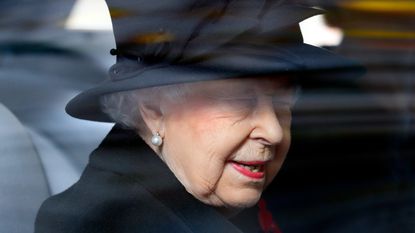 Queen's heartbreak: Queen Elizabeth II travels in her chauffeur driven Bentley car